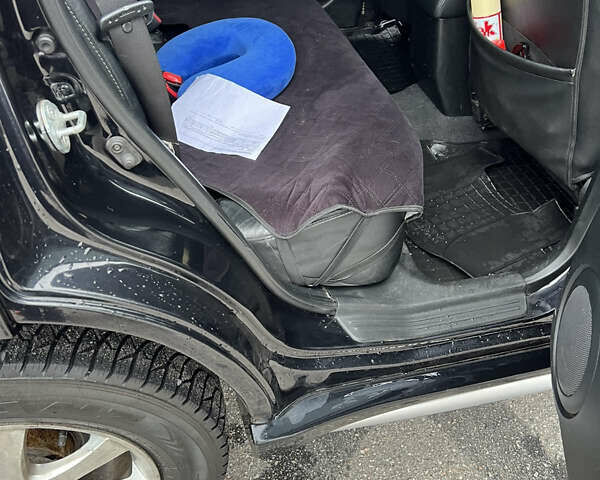 Чорний Міцубісі Аутлендер, об'ємом двигуна 2.38 л та пробігом 190 тис. км за 6800 $, фото 16 на Automoto.ua