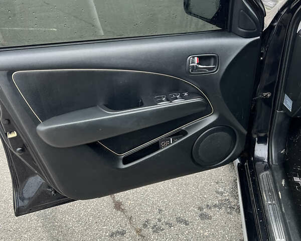 Чорний Міцубісі Аутлендер, об'ємом двигуна 2.38 л та пробігом 190 тис. км за 6800 $, фото 12 на Automoto.ua