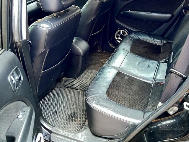 Чорний Міцубісі Аутлендер, об'ємом двигуна 2 л та пробігом 295 тис. км за 7500 $, фото 9 на Automoto.ua