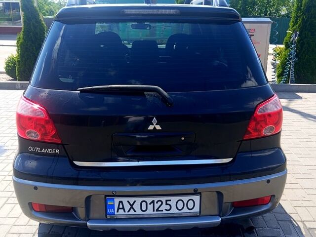 Черный Мицубиси Аутлендер, объемом двигателя 2.4 л и пробегом 270 тыс. км за 7800 $, фото 8 на Automoto.ua
