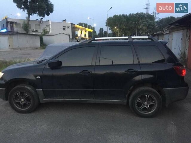 Чорний Міцубісі Аутлендер, об'ємом двигуна 2 л та пробігом 310 тис. км за 6500 $, фото 8 на Automoto.ua