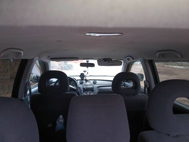 Черный Мицубиси Аутлендер, объемом двигателя 2 л и пробегом 495 тыс. км за 4400 $, фото 2 на Automoto.ua