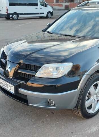 Міцубісі Аутлендер 2005 у Чернігові на Automoto.ua Чорний Міцубісі Аутлендер, об'ємом двигуна 2.38 л та пробігом 224 тис. км за 6000 $, фото 8 на Automoto.ua
