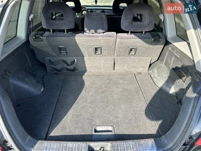 Черный Мицубиси Аутлендер, объемом двигателя 2.4 л и пробегом 307 тыс. км за 5600 $, фото 23 на Automoto.ua