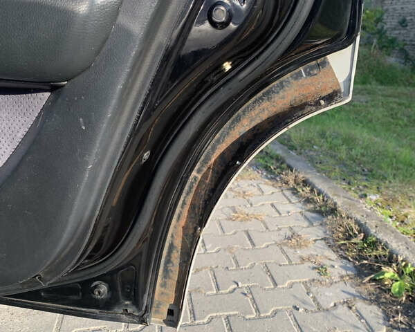 Чорний Міцубісі Аутлендер, об'ємом двигуна 2.4 л та пробігом 285 тис. км за 4300 $, фото 15 на Automoto.ua