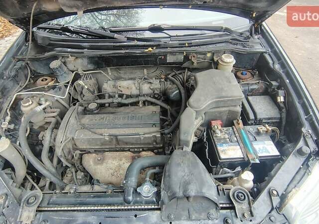 Черный Мицубиси Аутлендер, объемом двигателя 2 л и пробегом 330 тыс. км за 4997 $, фото 17 на Automoto.ua