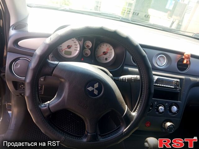 Черный Мицубиси Аутлендер, объемом двигателя 2.4 л и пробегом 270 тыс. км за 7800 $, фото 10 на Automoto.ua