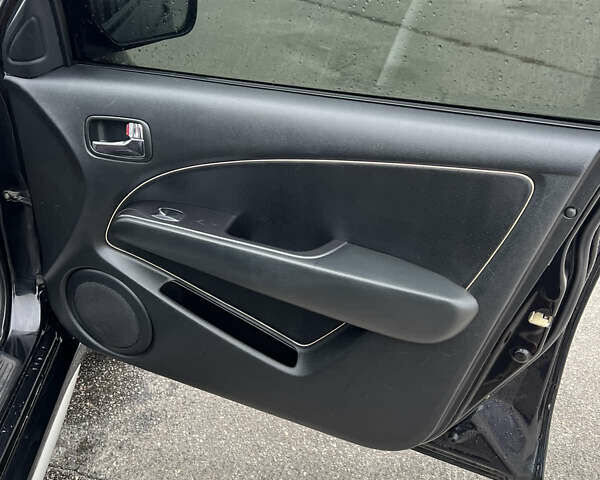 Чорний Міцубісі Аутлендер, об'ємом двигуна 2.38 л та пробігом 190 тис. км за 6800 $, фото 11 на Automoto.ua