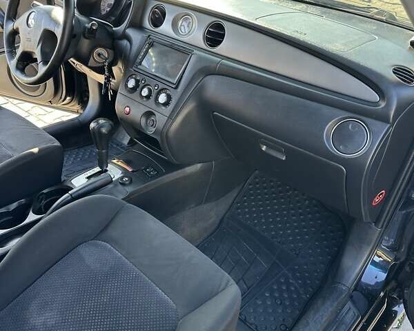 Черный Мицубиси Аутлендер, объемом двигателя 2.4 л и пробегом 307 тыс. км за 5600 $, фото 17 на Automoto.ua