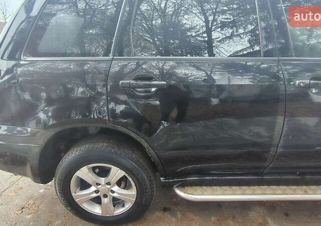 Черный Мицубиси Аутлендер, объемом двигателя 2 л и пробегом 330 тыс. км за 4997 $, фото 9 на Automoto.ua