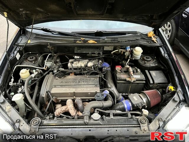 Черный Мицубиси Аутлендер, объемом двигателя 2 л и пробегом 295 тыс. км за 7500 $, фото 10 на Automoto.ua