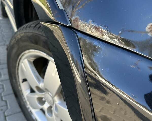 Черный Мицубиси Аутлендер, объемом двигателя 2.4 л и пробегом 307 тыс. км за 5600 $, фото 13 на Automoto.ua