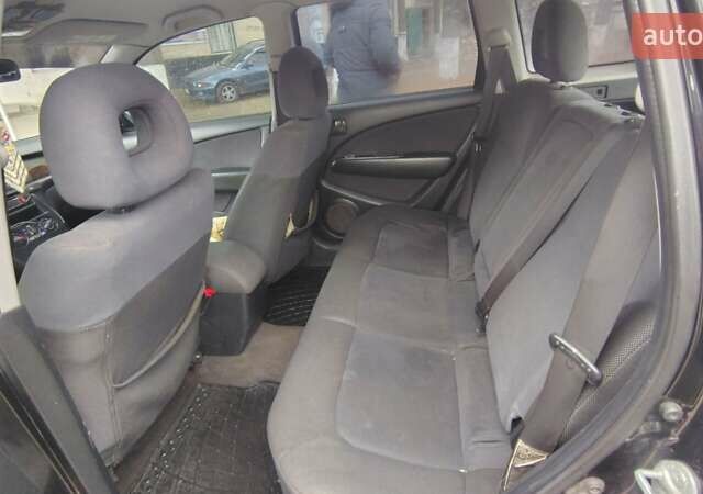 Черный Мицубиси Аутлендер, объемом двигателя 2 л и пробегом 330 тыс. км за 4997 $, фото 14 на Automoto.ua