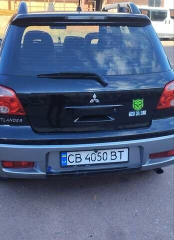 Міцубісі Аутлендер 2005 у Чернігові на Automoto.ua Чорний Міцубісі Аутлендер, об'ємом двигуна 2.38 л та пробігом 224 тис. км за 6000 $, фото 9 на Automoto.ua