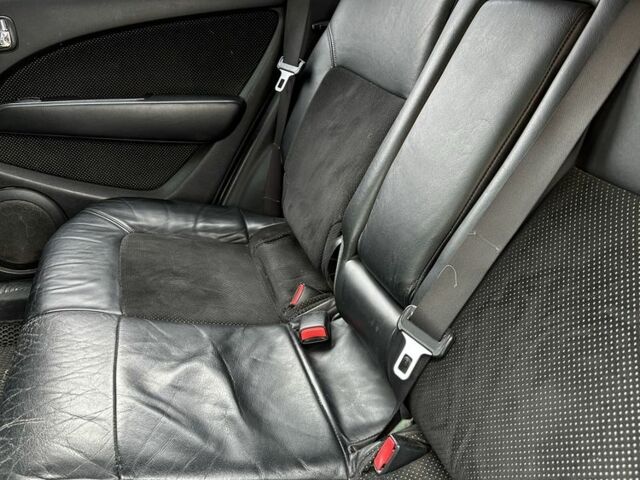 Черный Мицубиси Аутлендер, объемом двигателя 2.4 л и пробегом 258 тыс. км за 5400 $, фото 6 на Automoto.ua