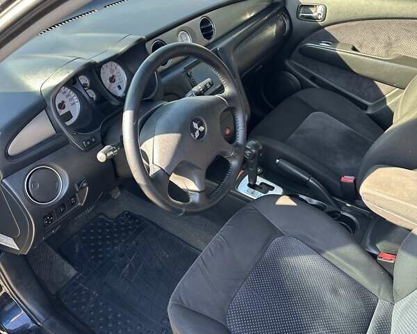 Черный Мицубиси Аутлендер, объемом двигателя 2.4 л и пробегом 307 тыс. км за 5600 $, фото 15 на Automoto.ua