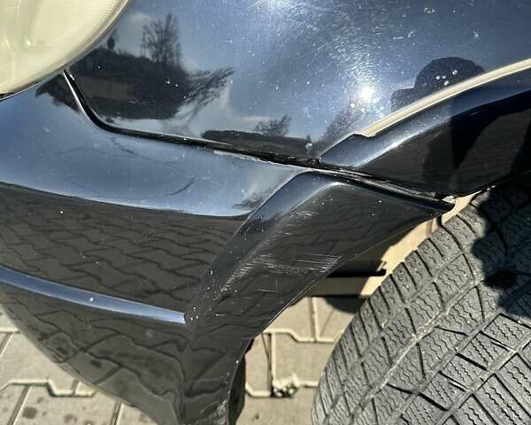 Черный Мицубиси Аутлендер, объемом двигателя 2.4 л и пробегом 307 тыс. км за 5600 $, фото 12 на Automoto.ua