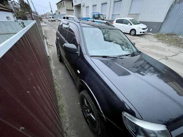 Черный Мицубиси Аутлендер, объемом двигателя 2.4 л и пробегом 234 тыс. км за 5499 $, фото 5 на Automoto.ua