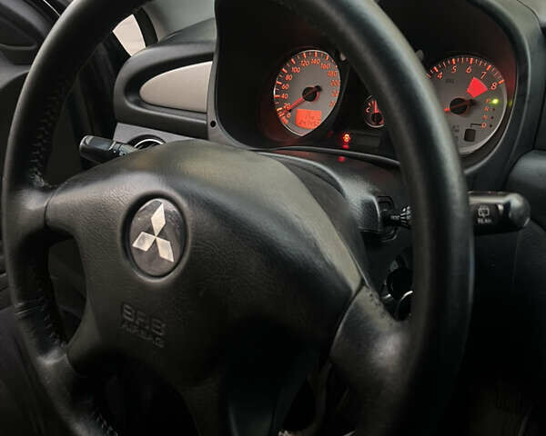 Чорний Міцубісі Аутлендер, об'ємом двигуна 2.38 л та пробігом 247 тис. км за 5499 $, фото 54 на Automoto.ua