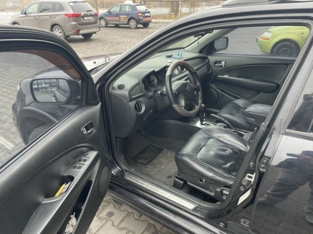 Черный Мицубиси Аутлендер, объемом двигателя 2.4 л и пробегом 234 тыс. км за 5499 $, фото 21 на Automoto.ua