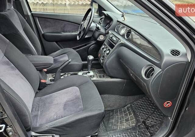 Черный Мицубиси Аутлендер, объемом двигателя 2.4 л и пробегом 167 тыс. км за 6150 $, фото 19 на Automoto.ua