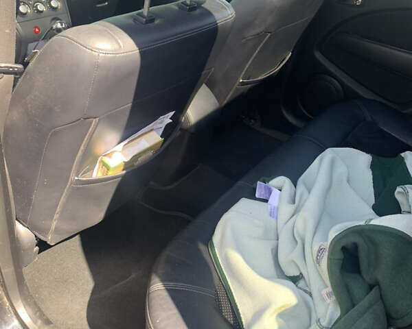 Черный Мицубиси Аутлендер, объемом двигателя 2 л и пробегом 212 тыс. км за 6000 $, фото 22 на Automoto.ua