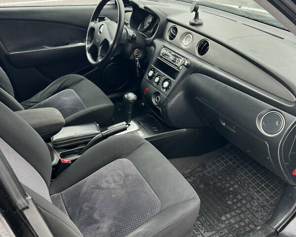 Чорний Міцубісі Аутлендер, об'ємом двигуна 2.4 л та пробігом 308 тис. км за 4700 $, фото 9 на Automoto.ua