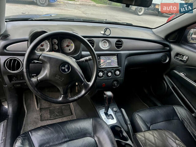 Чорний Міцубісі Аутлендер, об'ємом двигуна 2.38 л та пробігом 247 тис. км за 5499 $, фото 48 на Automoto.ua