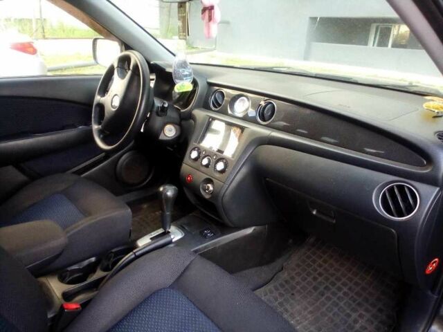 Черный Мицубиси Аутлендер, объемом двигателя 2.4 л и пробегом 240 тыс. км за 5700 $, фото 2 на Automoto.ua