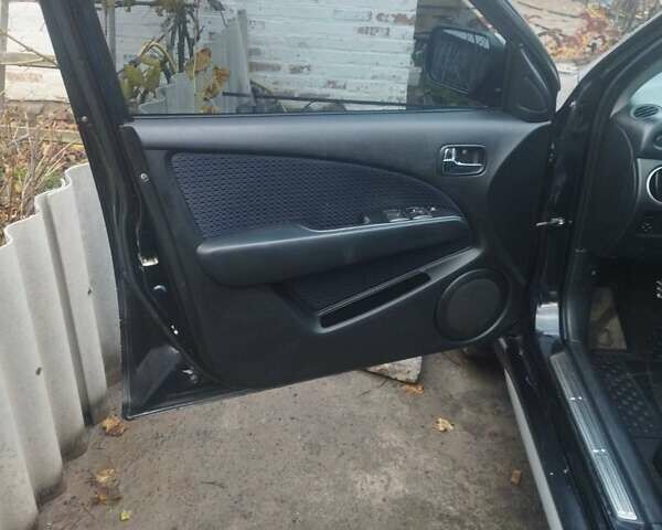 Черный Мицубиси Аутлендер, объемом двигателя 2.4 л и пробегом 280 тыс. км за 5455 $, фото 10 на Automoto.ua