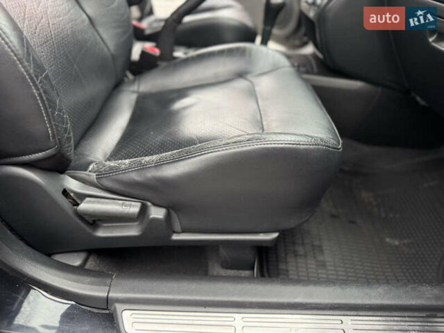 Черный Мицубиси Аутлендер, объемом двигателя 2.4 л и пробегом 242 тыс. км за 6800 $, фото 56 на Automoto.ua