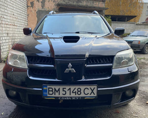 Міцубісі Аутлендер 2006 у Конотопе на Automoto.ua Чорний Міцубісі Аутлендер, об'ємом двигуна 2 л та пробігом 257 тис. км за 5800 $, фото 1 на Automoto.ua