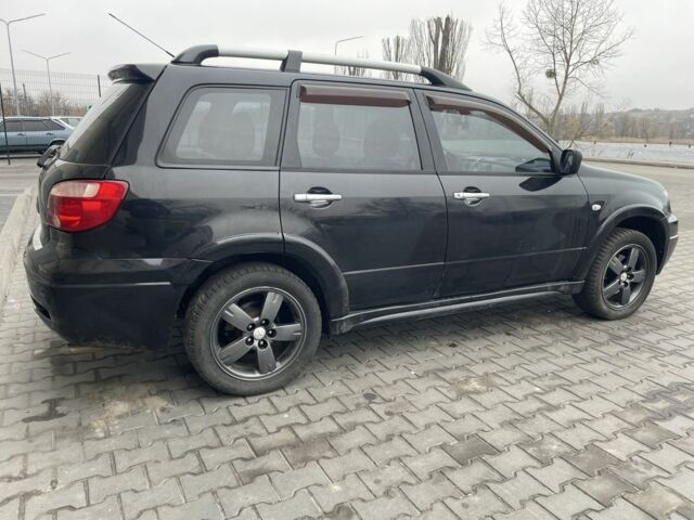 Черный Мицубиси Аутлендер, объемом двигателя 2.4 л и пробегом 234 тыс. км за 5499 $, фото 16 на Automoto.ua