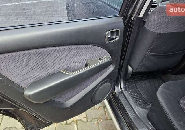 Черный Мицубиси Аутлендер, объемом двигателя 2.4 л и пробегом 167 тыс. км за 6150 $, фото 23 на Automoto.ua