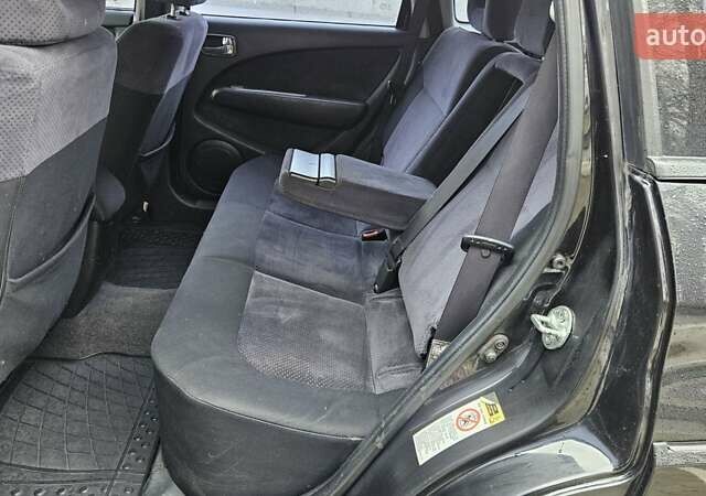 Черный Мицубиси Аутлендер, объемом двигателя 2.4 л и пробегом 167 тыс. км за 6150 $, фото 22 на Automoto.ua