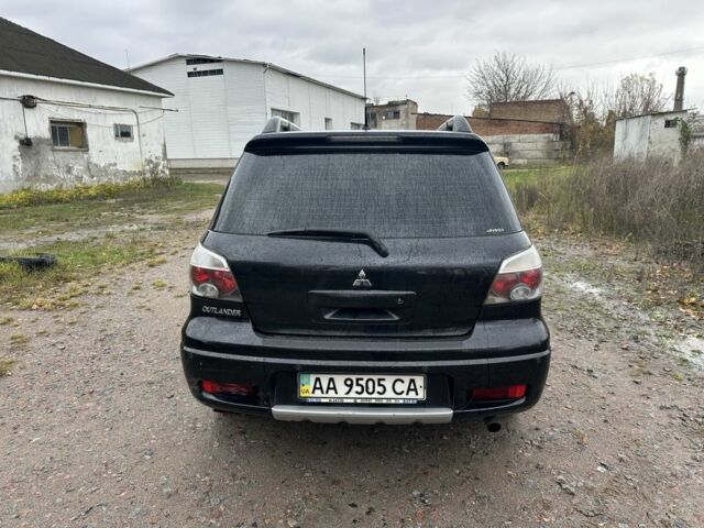 Чорний Міцубісі Аутлендер, об'ємом двигуна 2.4 л та пробігом 220 тис. км за 4300 $, фото 13 на Automoto.ua