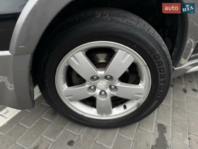 Черный Мицубиси Аутлендер, объемом двигателя 2.4 л и пробегом 242 тыс. км за 6800 $, фото 22 на Automoto.ua