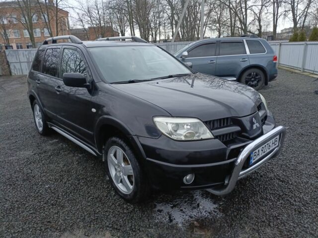 Черный Мицубиси Аутлендер, объемом двигателя 2 л и пробегом 200 тыс. км за 5100 $, фото 10 на Automoto.ua