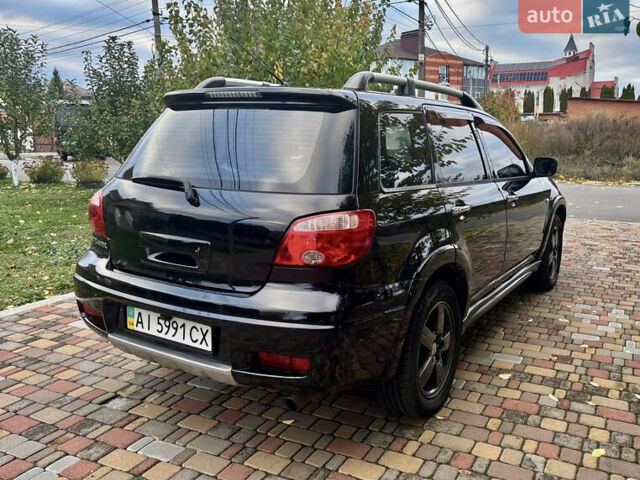 Чорний Міцубісі Аутлендер, об'ємом двигуна 2.38 л та пробігом 247 тис. км за 5499 $, фото 23 на Automoto.ua