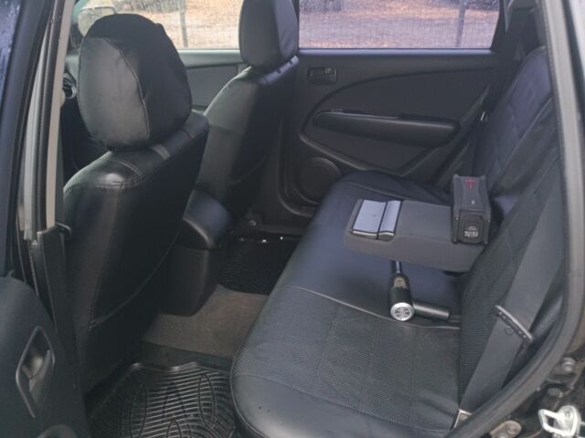 Чорний Міцубісі Аутлендер, об'ємом двигуна 2 л та пробігом 260 тис. км за 5400 $, фото 5 на Automoto.ua