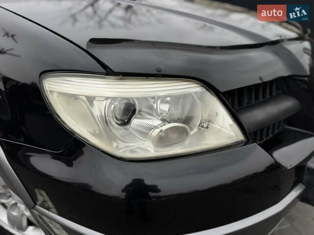 Черный Мицубиси Аутлендер, объемом двигателя 2.4 л и пробегом 242 тыс. км за 6800 $, фото 6 на Automoto.ua