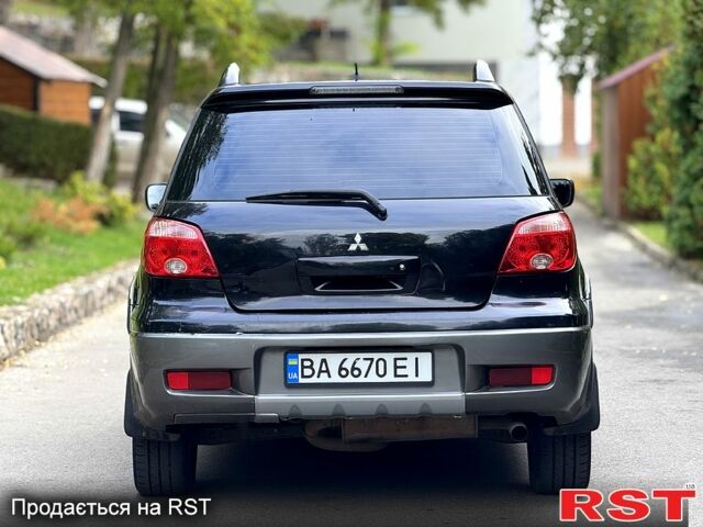 Міцубісі Аутлендер 2006 у Кропивницькому (Кіровограді) на Automoto.ua Чорний Міцубісі Аутлендер, об'ємом двигуна 2.4 л та пробігом 263 тис. км за 5999 $, фото 4 на Automoto.ua