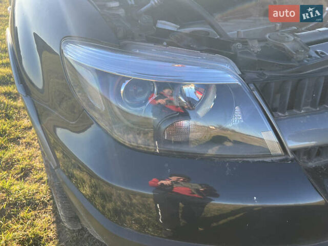 Черный Мицубиси Аутлендер, объемом двигателя 2.38 л и пробегом 230 тыс. км за 5350 $, фото 16 на Automoto.ua