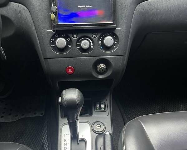 Черный Мицубиси Аутлендер, объемом двигателя 2.4 л и пробегом 277 тыс. км за 6700 $, фото 6 на Automoto.ua