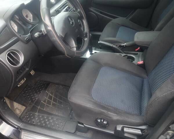 Черный Мицубиси Аутлендер, объемом двигателя 2.4 л и пробегом 280 тыс. км за 5455 $, фото 9 на Automoto.ua