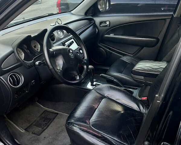 Чорний Міцубісі Аутлендер, об'ємом двигуна 2.38 л та пробігом 247 тис. км за 5499 $, фото 45 на Automoto.ua