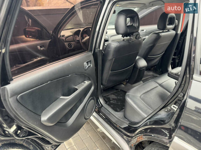 Черный Мицубиси Аутлендер, объемом двигателя 2.4 л и пробегом 242 тыс. км за 6800 $, фото 39 на Automoto.ua