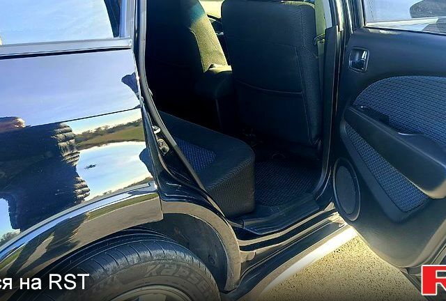 Міцубісі Аутлендер 2006 у Дніпро (Дніпропетровську) на Automoto.ua Чорний Міцубісі Аутлендер, об'ємом двигуна 2.4 л та пробігом 265 тис. км за 7500 $, фото 11 на Automoto.ua