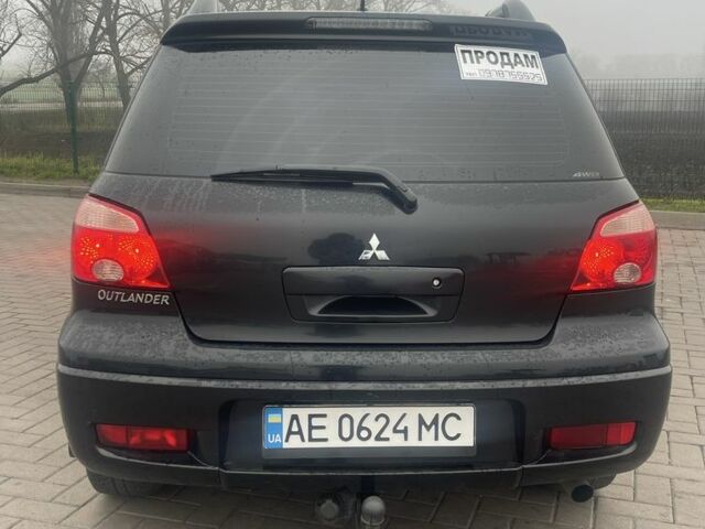 Чорний Міцубісі Аутлендер, об'ємом двигуна 2.4 л та пробігом 277 тис. км за 6700 $, фото 5 на Automoto.ua