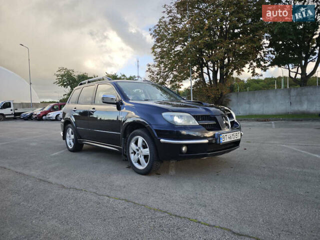 Чорний Міцубісі Аутлендер, об'ємом двигуна 2 л та пробігом 207 тис. км за 6900 $, фото 2 на Automoto.ua